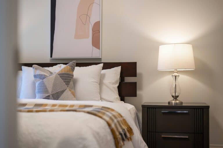 bedroom, organized and comfortable after a cleaning service